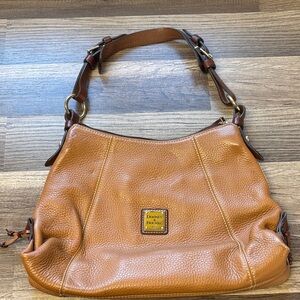 Dooney & Bourke Pebble Grain Leather Hobo shoulder bag in a tan or chestnut